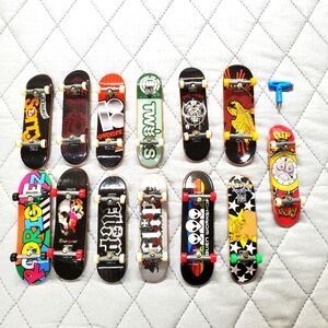 Lot of 13 Tech Deck skateboard toys